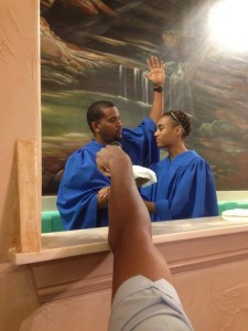 another youth getting baptized